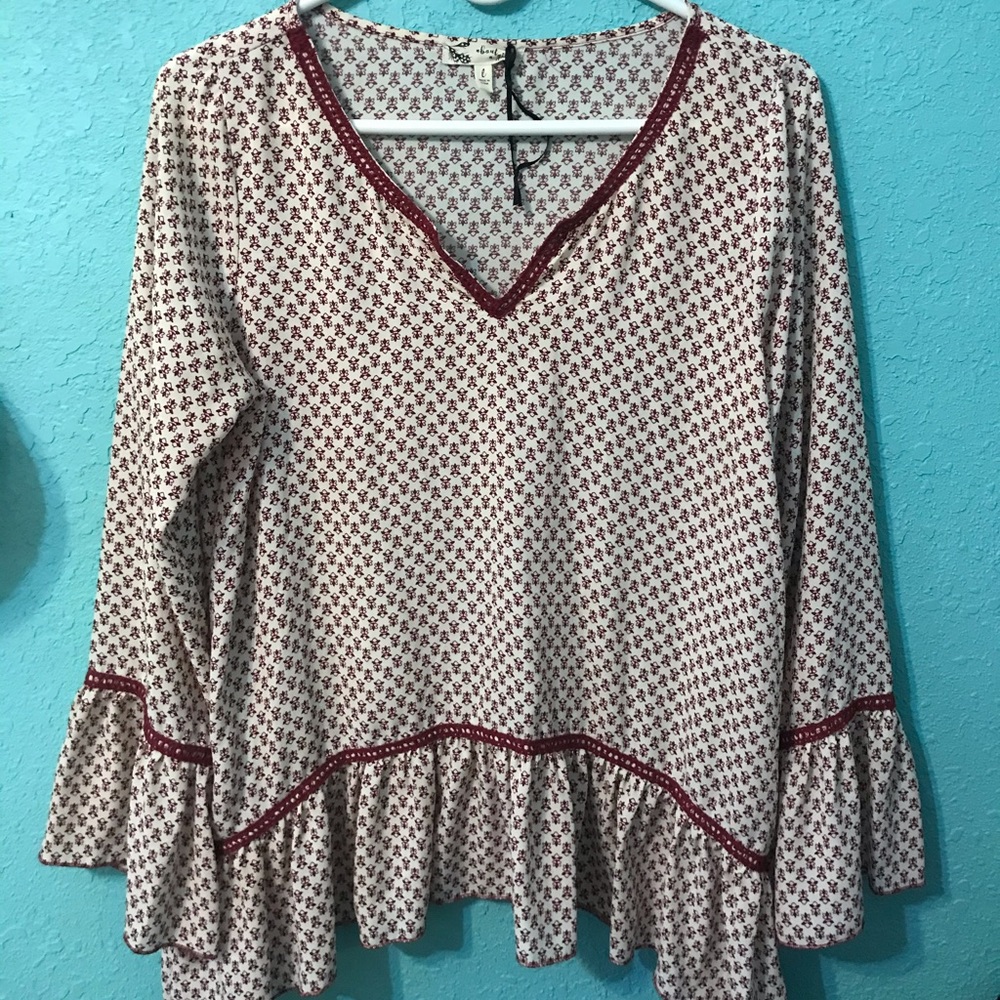 Red/ white flowy patterned shirt